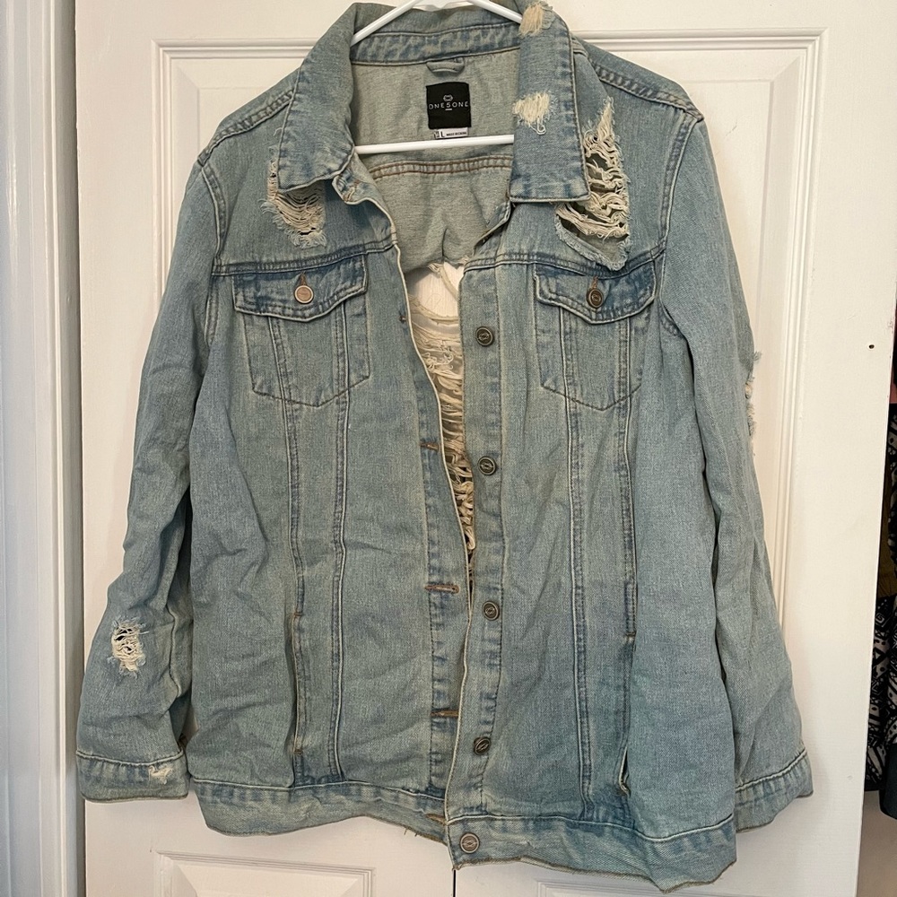 Long ripped denim jacket